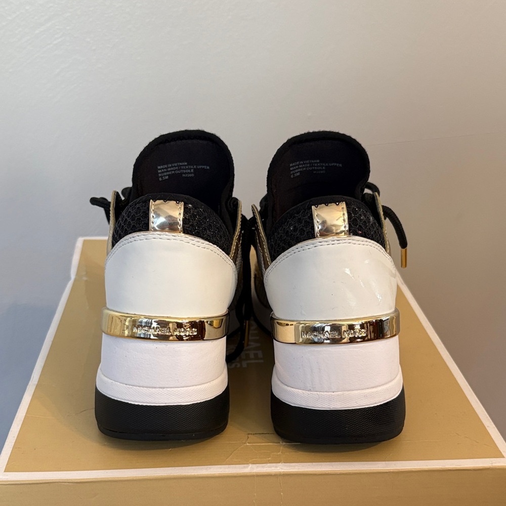 Michael Kors Black, White, and Gold Women's Sneakers - Picture 4 of 5